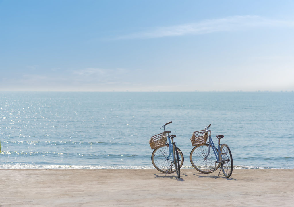 Two bicycles on a beach in San Diego