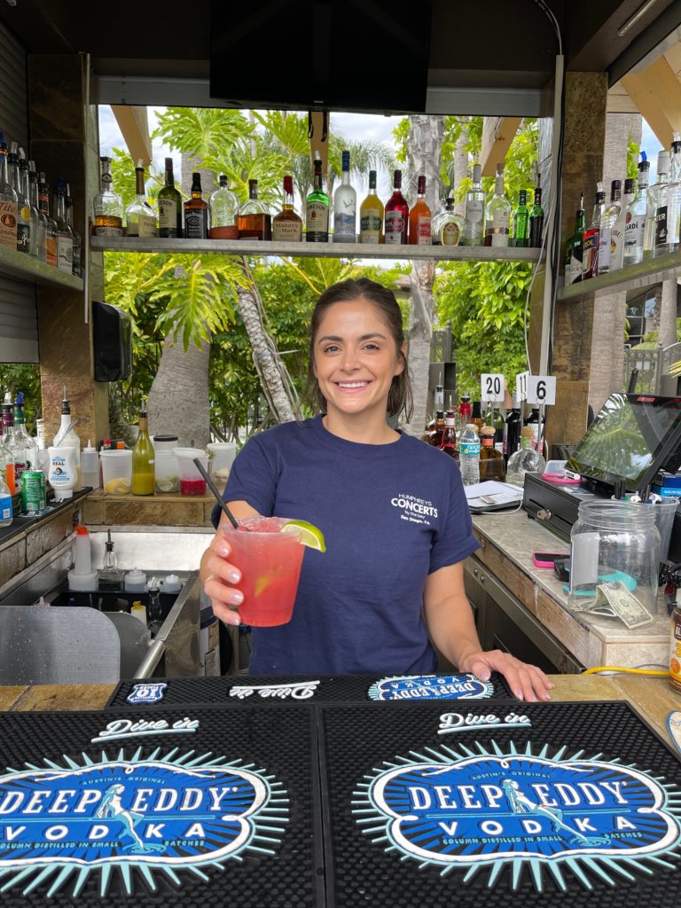 Outdoor bar bartender with cocktail