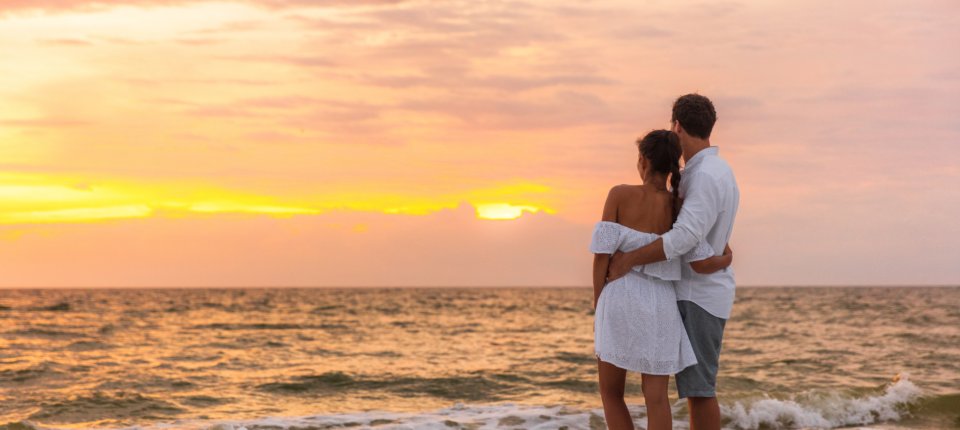 couple at sunset at the beach